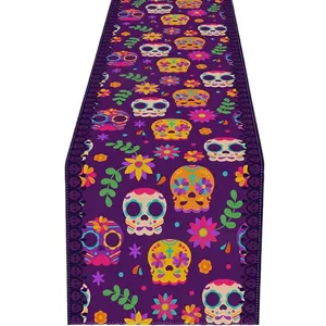 Vibrant purple Day of the Dead table runner with colorful Mexican sugar skull and floral prints