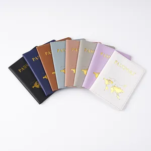 Multiple colorful PVC passport covers with golden world map pattern shown in a fan arrangement