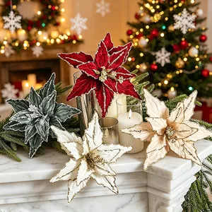 Detail view of 26cm glitter velvet poinsettias in red, white, and champagne colors.