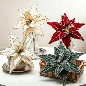 Detailed view of 26cm velvet Christmas flowers in red, green, and white with glitter edges