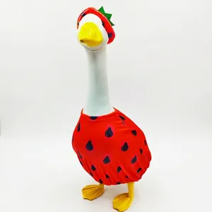 Detailed view of the cute strawberry costume on a 23-inch decorative porch white goose