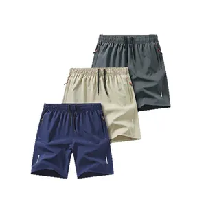 Set mit drei schnelltrocknenden Eisseide-Sportshorts für Herren in Blau und Grau.