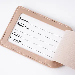 Detail of durable PU leather luggage tag with information card slots