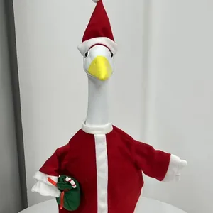 Detailed view of a 23-inch porch goose in a red Santa Claus outfit with a gift bag