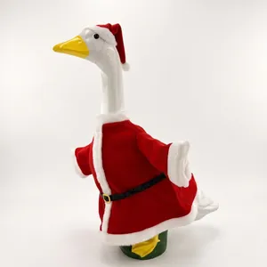 Detailed view of a 23-inch porch goose statue wearing a red Santa Christmas outfit