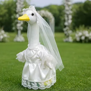 Detailed view of handmade white bridal wedding dress outfit for 23-inch porch goose ornament