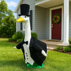 Detail of a 23-inch large white porch goose wearing a formal tuxedo outfit and top hat