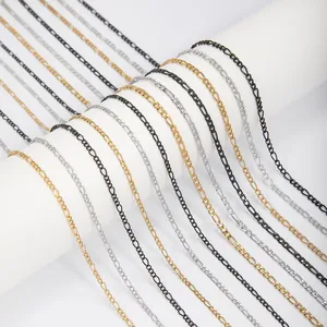 Detail of Figaro 3:1 stainless steel chains in gold, silver, and black finishes