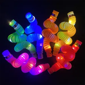 Close-up of colorful LED glowing pop tubes showing vibrant light effects in the dark.