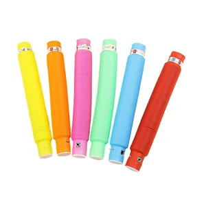 Set of six colorful LED light-up pop tube sensory fidget toys in vibrant rainbow shades.