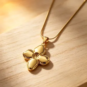 Elegant gold-plated four-leaf clover pendant necklace with smooth finish for women