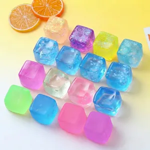 Close-up of colorful translucent cube squeeze toys with glitter and snowflake details