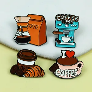 Detailed view of four colorful coffee-themed enamel pins including espresso machine and cups.