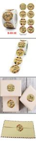 Close-up view of floral Kraft Thank You stickers on gift boxes and envelopes