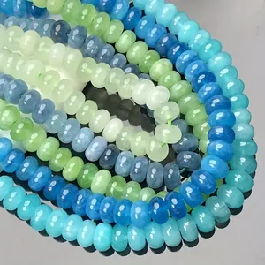 Close-up of 5x8mm blue and green crystal chalcedony abacus beads for DIY jewelry