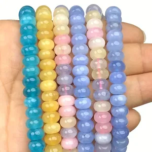Close-up detail of 5x8mm colorful translucent chalcedony abacus beads for DIY handmade jewelry.