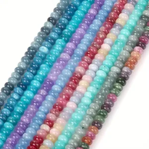 Detailed macro view of multi-colored 5x8mm crystal chalcedony abacus beads for DIY jewelry