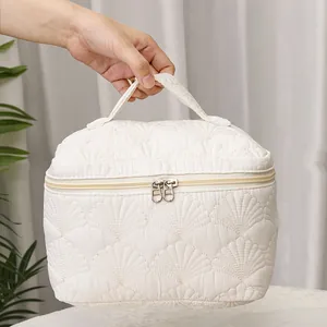 Large capacity shell quilted makeup bag with handle and double zippers