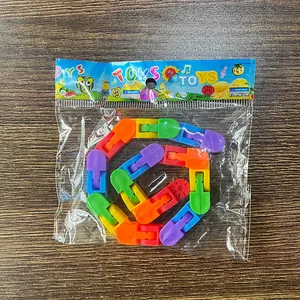 Colorful 24-segment wacky track articulated fidget toy in transparent packaging