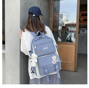 Zaino scolastico blu e bianco grande capacità con portachiavi a orsetto
