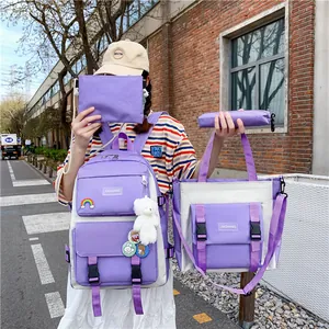 Set di cinque zaini viola per la scuola con borsa tote e astuccio per gli studenti