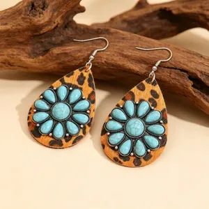 Vintage Western style teardrop earrings featuring turquoise flower and leopard leather