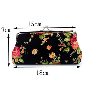 Vintage Blumen-Canvas-Geldbeutel mit Kussverschluss und Maßen 18cm x 9cm x 15cm.