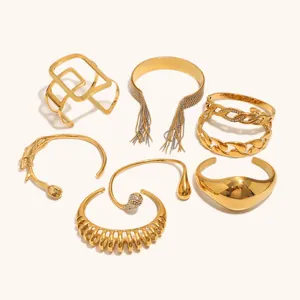 Collezione di bracciali rigidi in acciaio inossidabile placcato oro 18K in vari stili