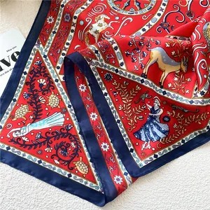 Elegant red square silk scarf featuring intricate folk-style animal and figure prints