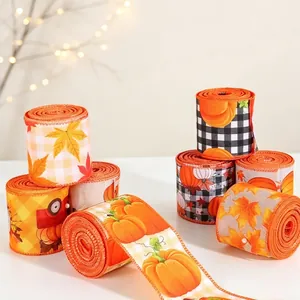Harvest theme burlap ribbons with pumpkin and maple leaf patterns for Thanksgiving decor.