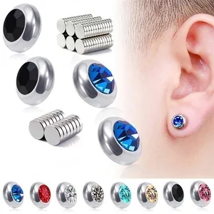 Macro detail of non-pierced magnetic stud earrings with colorful round rhinestones