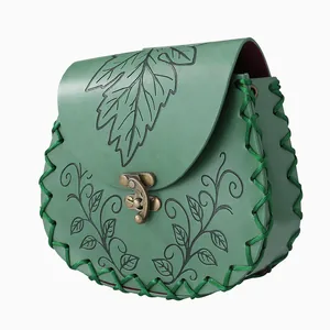 Detailed macro view of a green steampunk cosplay leather pouch with leaf engraving