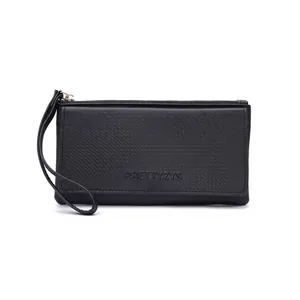 Detail view of a black long women's wallet with a wrist strap and embossed logo.