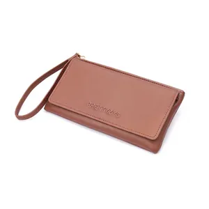 Elegant brown women's long wallet with wristlet strap and minimalist flap closure