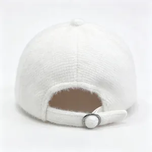 Back view of a white fuzzy baseball cap showing adjustable strap and metal buckle