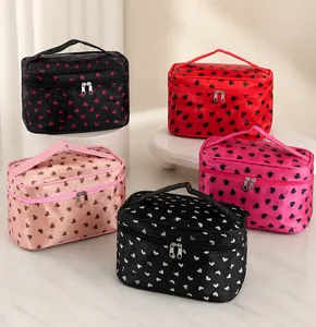 Macro view of heart-pattern cosmetic bags in various colors on a shelf