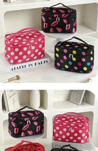 Detailed view of portable square makeup bags with polka dots and lip patterns