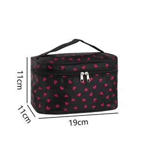 Portable black cosmetic bag with red heart pattern and dimensions 19x11x11cm shown in detail