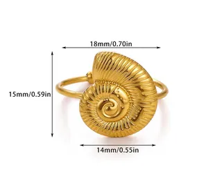 Détails d'une bague coquillage dorée en acier avec dimensions en mm/pouces
