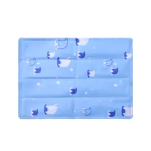 Blue gel cooling mat for pets featuring cute polar bear patterns for summer use
