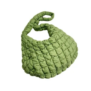 Trendy green puffy quilted shoulder bag for women with stylish bubble texture design