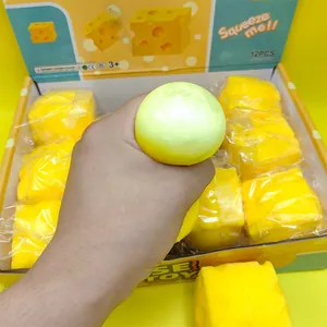 Close-up of yellow cheese squeeze toy showing soft texture and stress relief decompression