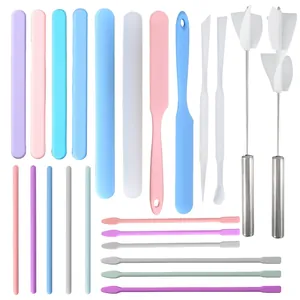 Detailed view of the multi-piece silicone resin stirring kit with electric mixers