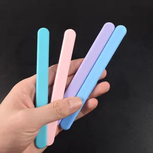 Set of reusable silicone stirring sticks for DIY resin art in various pastel colors.