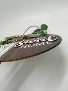Detail view showing the thickness of the round Home Sweet Home wooden sign plaque.