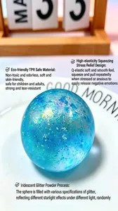 Macro detail of translucent blue maltose squeeze ball with iridescent glitter on a plate