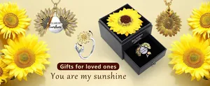 Geschenkset mit aufklappbarer Sonnenblumen-Halskette und Drehring in Box