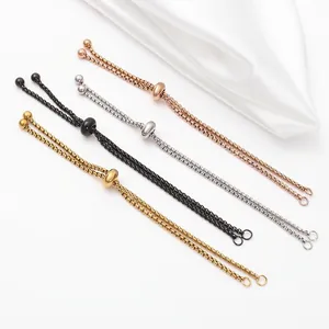 Detail view of four-color adjustable stainless steel slider bracelets with box chains.