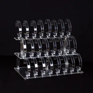 Clear 3-tier acrylic watch display stand with flexible C-rings for jewelry store