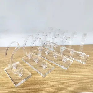 Thickened transparent acrylic watch display stand with flexible PC C-rings on wooden base